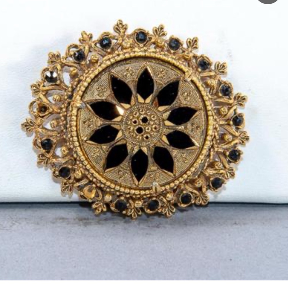 Elegant Gold and Black Floral Brooch